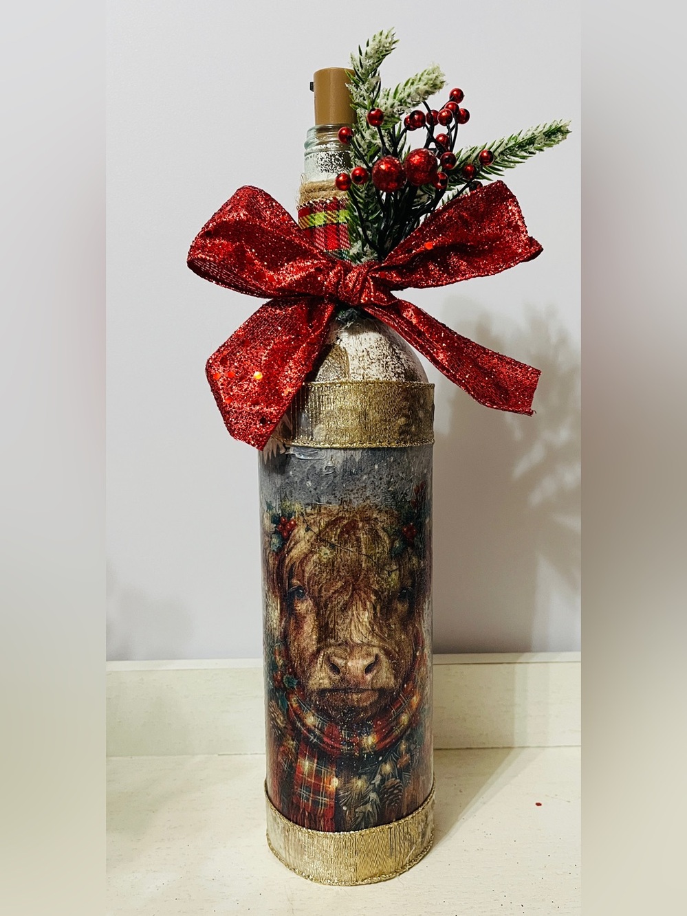 Holiday Bottle Decor with Red Bow and Festive Berry Sprig